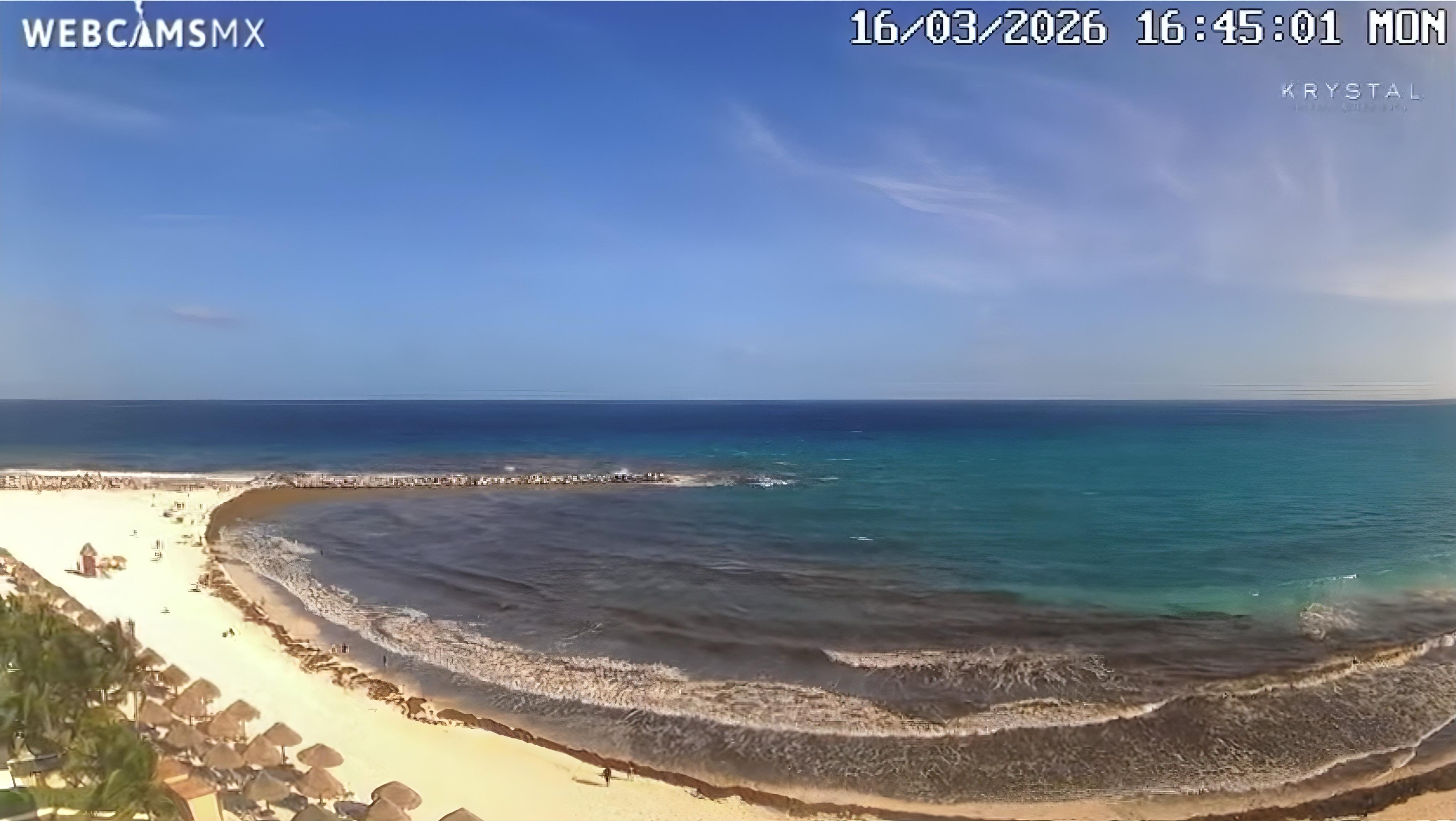Sargassum visible along Cancún Hotel Zone shoreline — live webcam, March 16 2026 at 4:45 PM